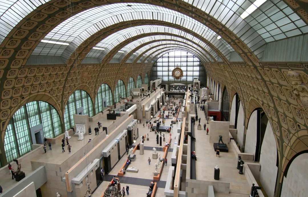 Visitors in the main hall of a museum